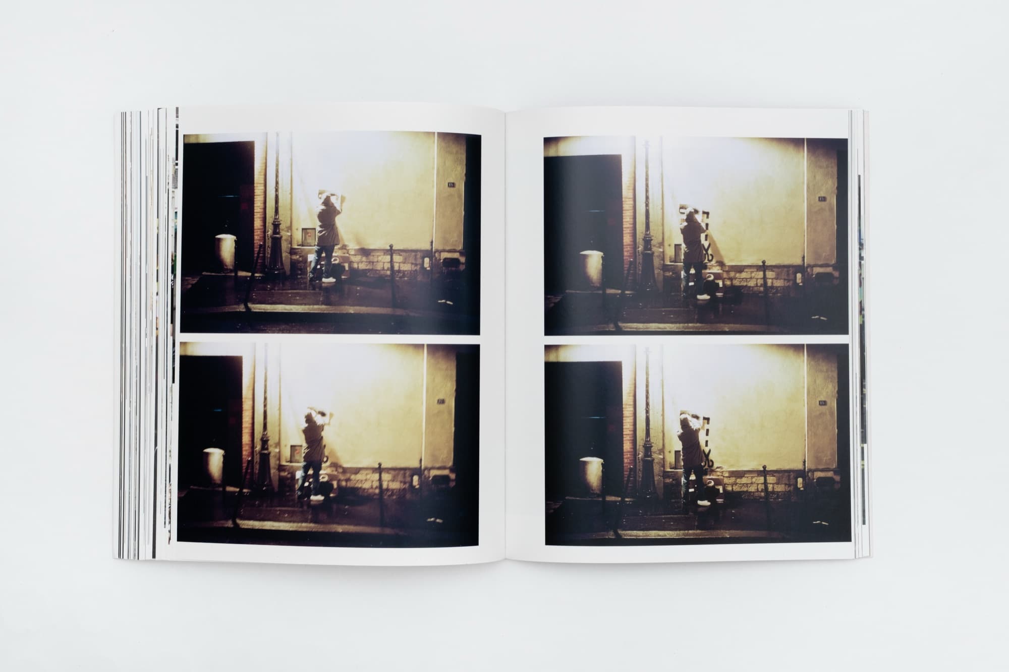 Contact sheet — Banksy working a wall at night, from Banksy Captured