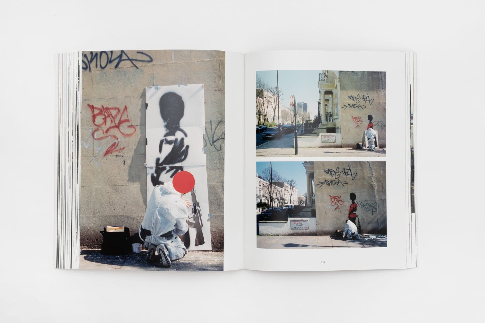 A stencilled-figure spread from the Banksy Captured archive