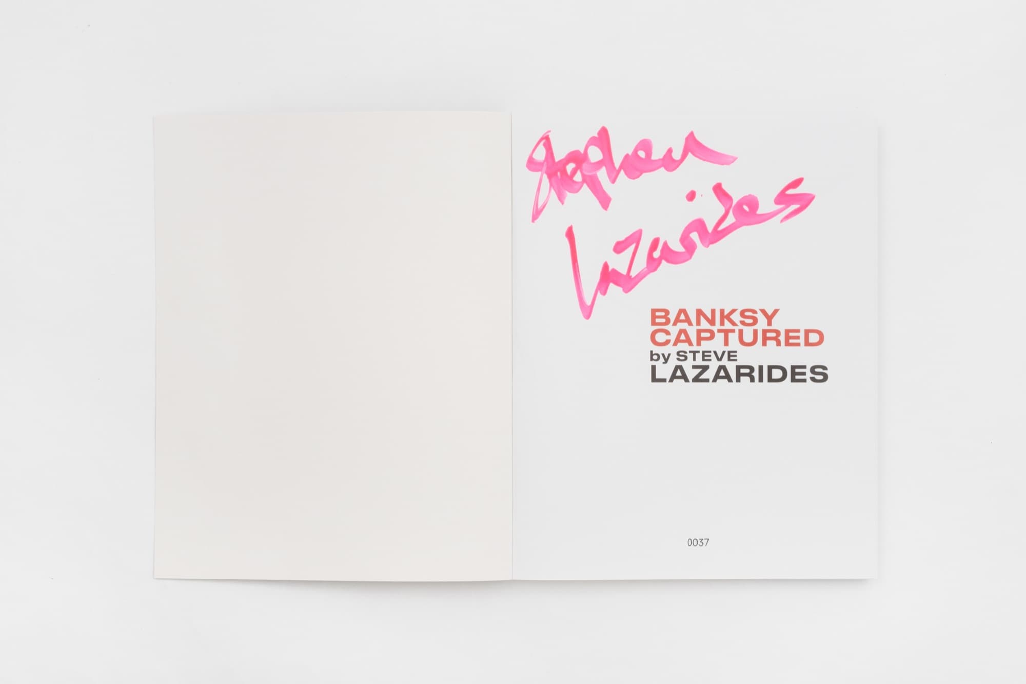 Signed and numbered title page of Banksy Captured