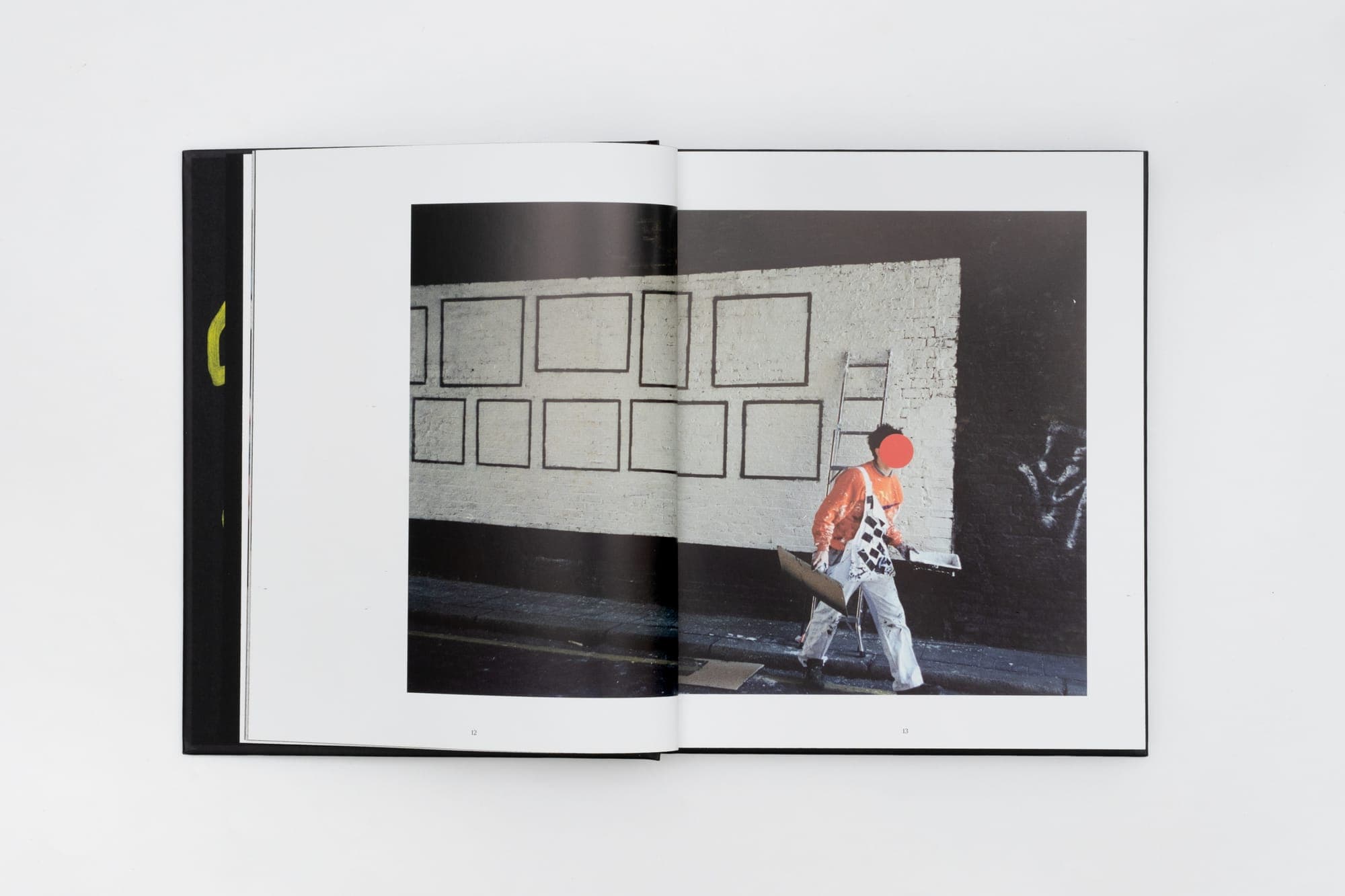 Spread — framed works on a gallery wall, from Banksy Captured