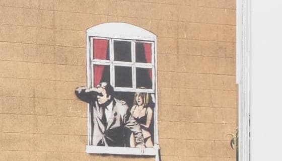 “Well Hung Lover”, Bristol — from Banksy Captured (pp.112–113).